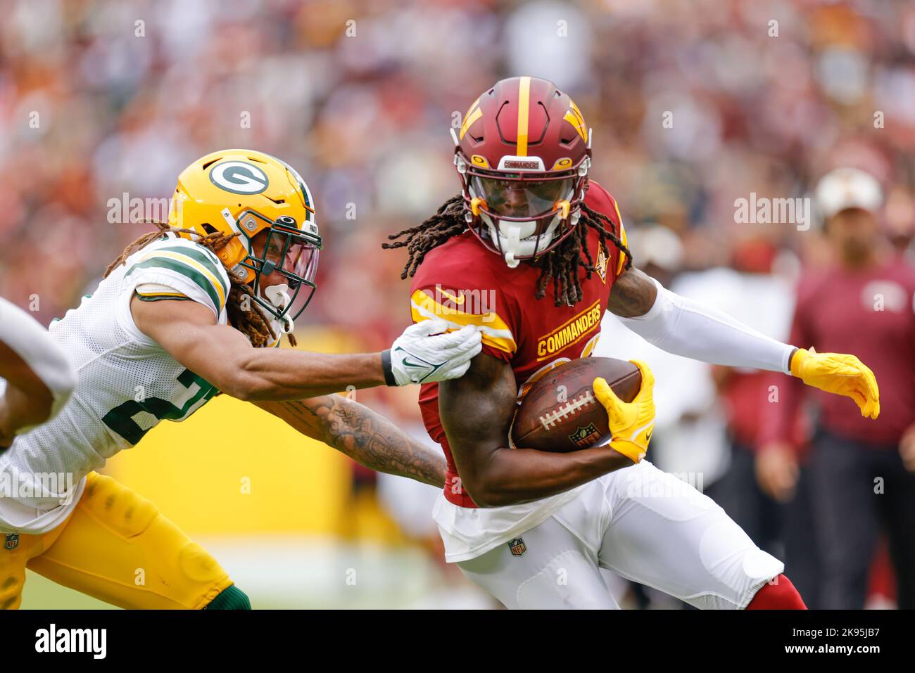 Sunday, October 23, 2022; Landover, MD, USA;  Washington Commanders wide receiver Cam Sims (89) runs with the ball during an NFL game against the Gree Stock Photo