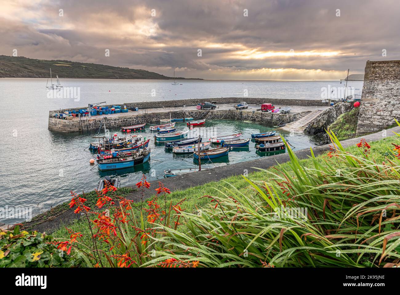 The boats parked in a harbor in the sunrise Stock Photo - Alamy