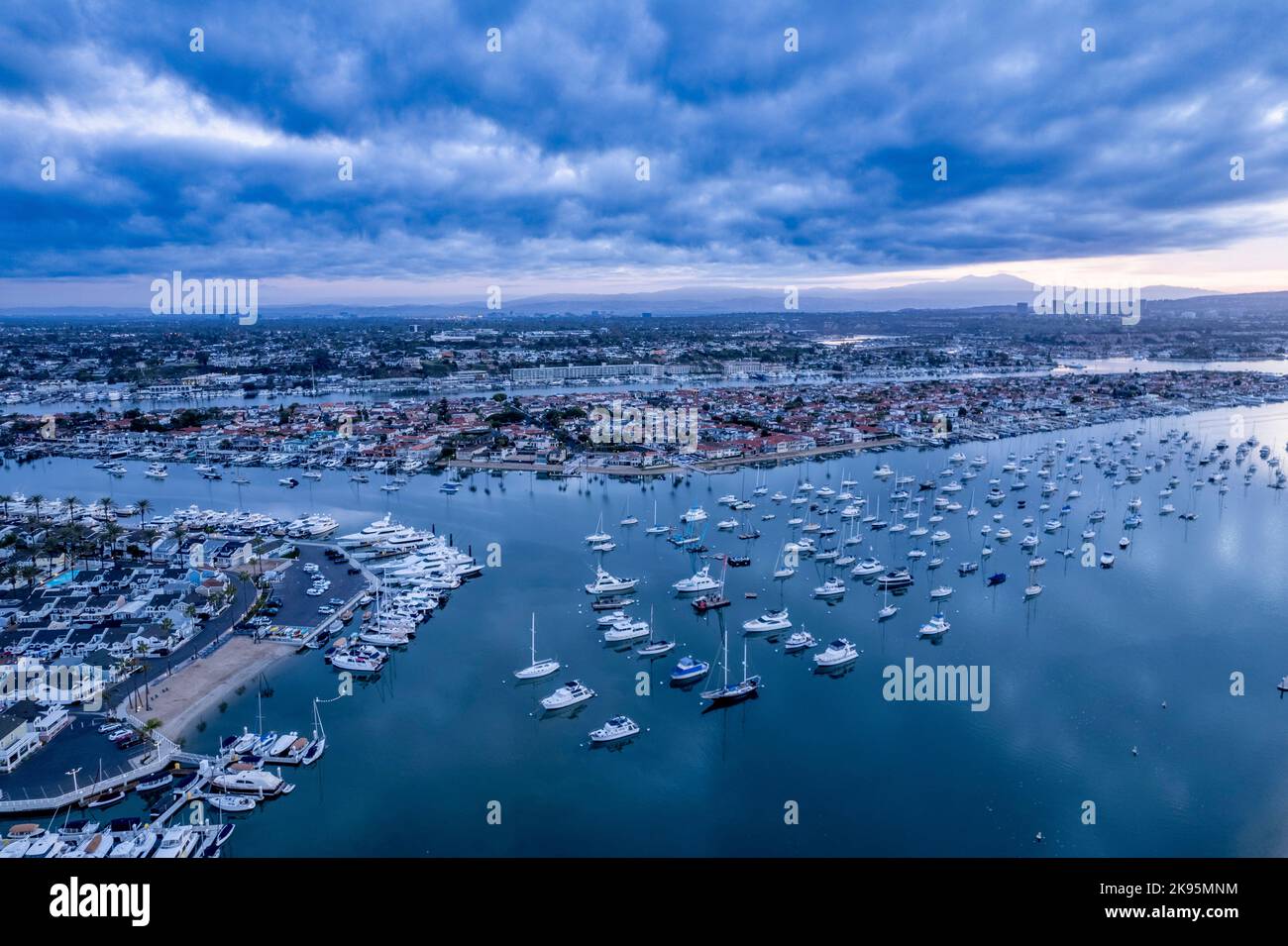 An aerial landscape view of Newport Beach, Orange County with aligned boats and ships, California Stock Photo