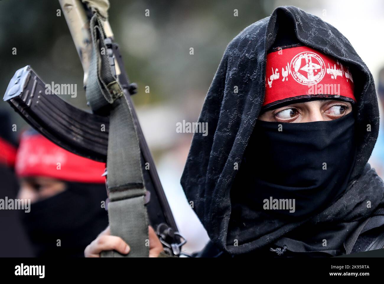 Gaza, Palestine. 25th Oct, 2022. A fighter from the Popular Front for the Liberation of Palestine participates in an anti-Israel military parade in Gaza City. (Photo by Yousef Masoud/SOPA Images/Sipa USA) Credit: Sipa USA/Alamy Live News Stock Photo