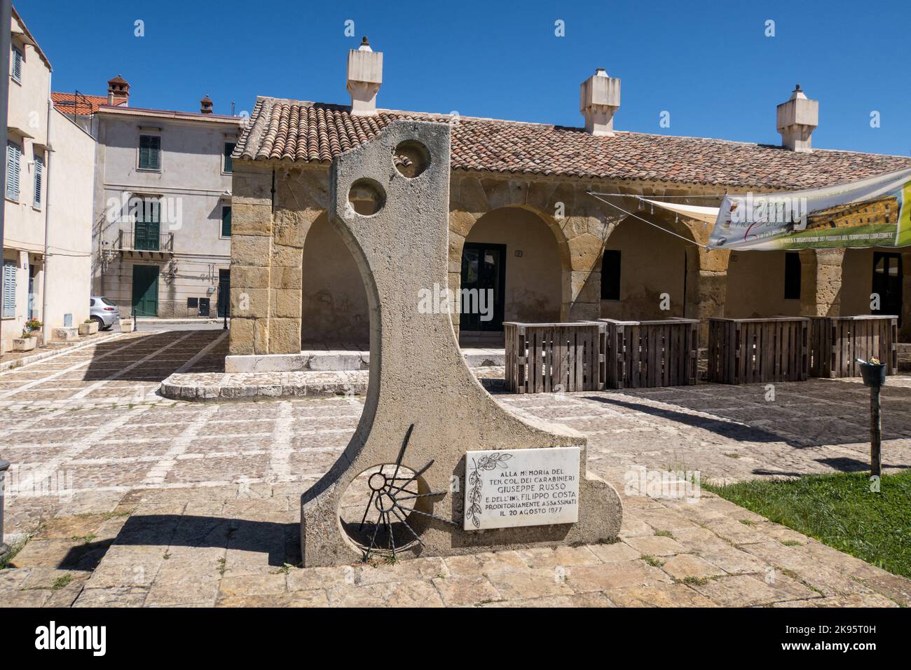 Italy, Sicily, Ficuzza. A monument in memory of two men killed by the Mafia on the village green. On August 20, 1977. Stock Photo