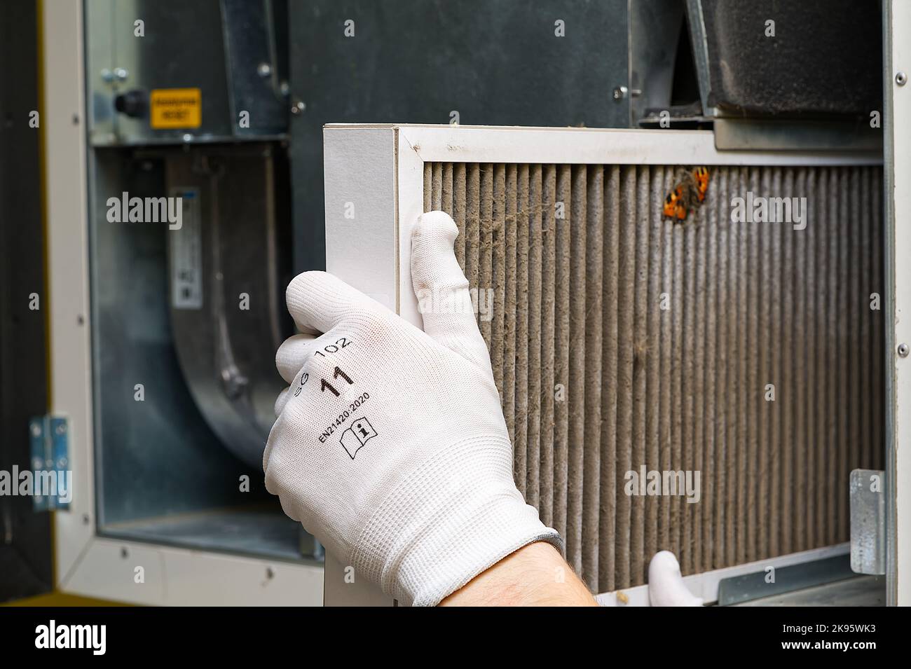 Replacing filter in the central ventilation system. hvac filter