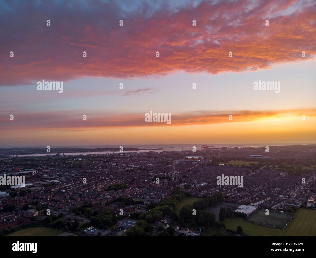 A beautiful pink sunset over the city Stock Photo - Alamy