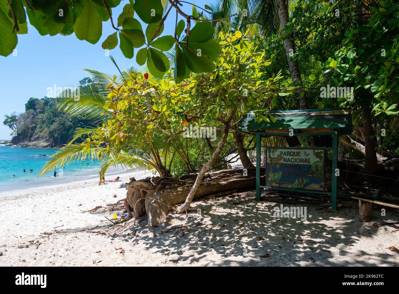 The wooden sign on the sandy tropical beach at Manuel Antonio National Park Quepos, Costa Rica