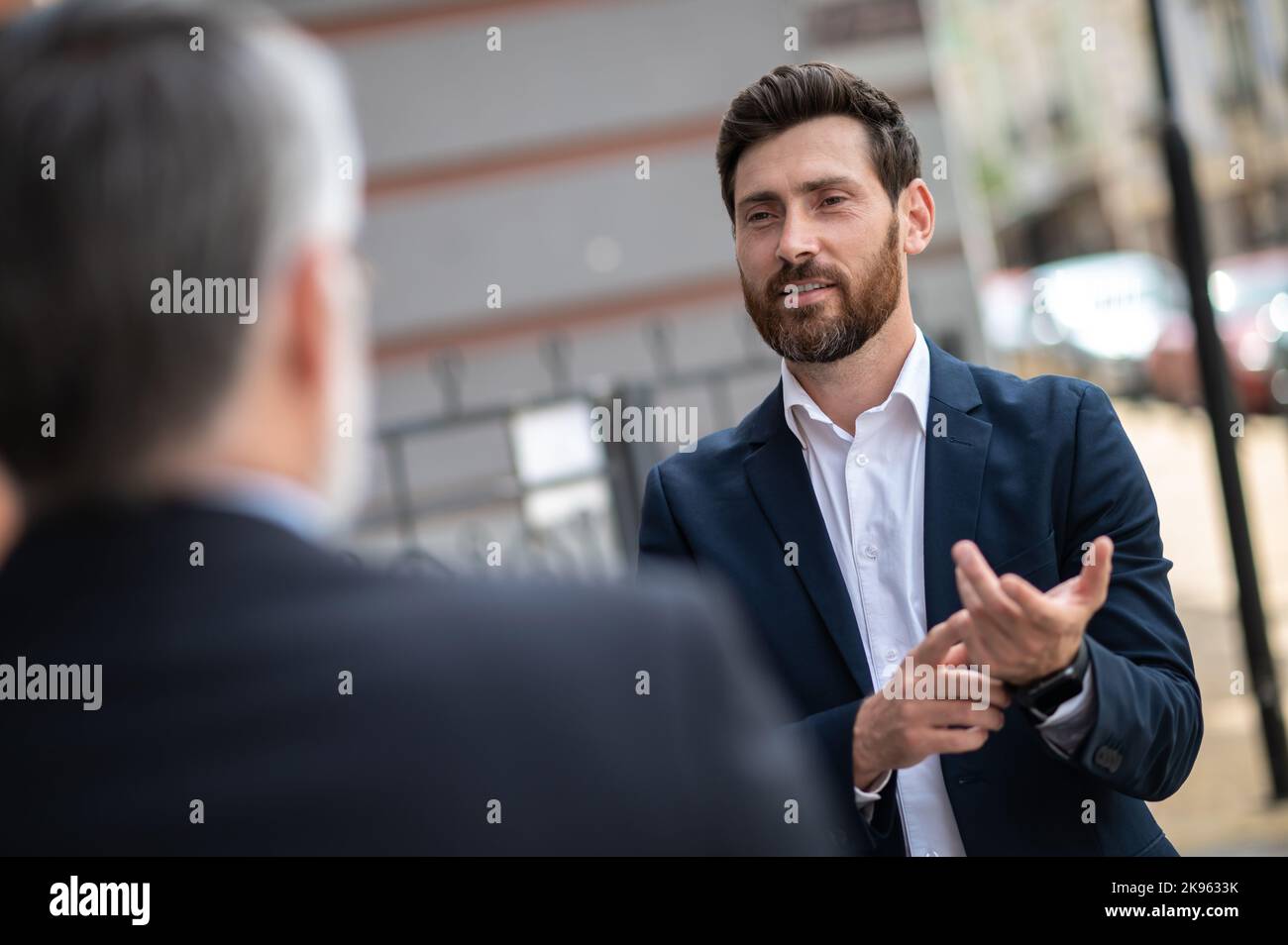 Two business partners having negotiations Stock Photo