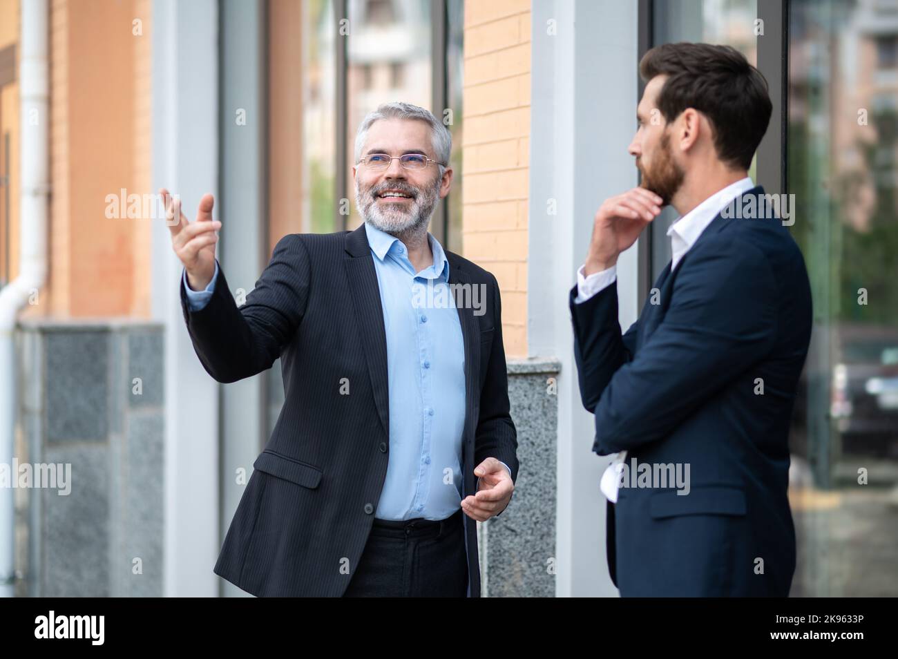 Two business partners having negotiations Stock Photo