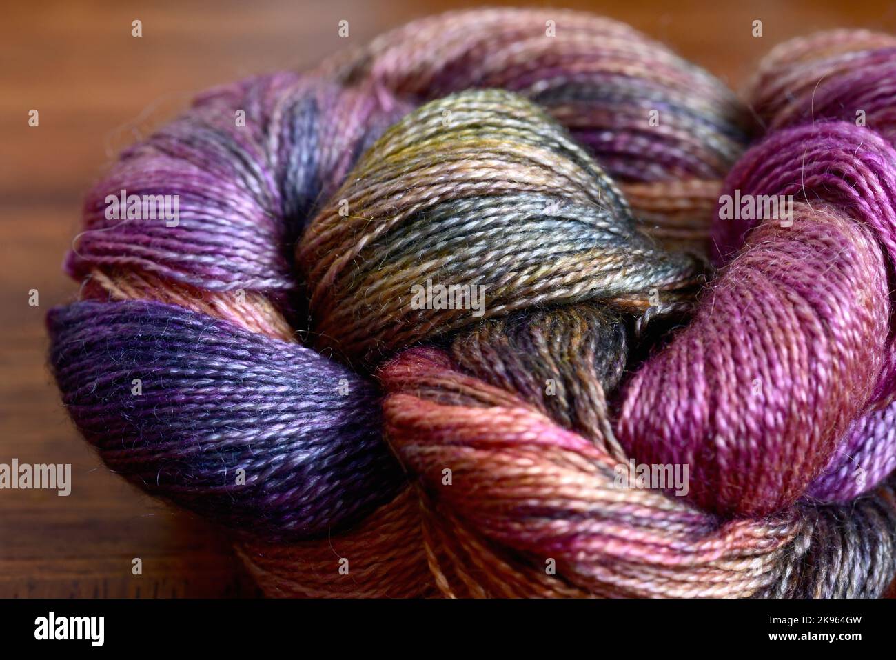 Close up of rainbow silk and alpaca lace weight yarn Stock Photo