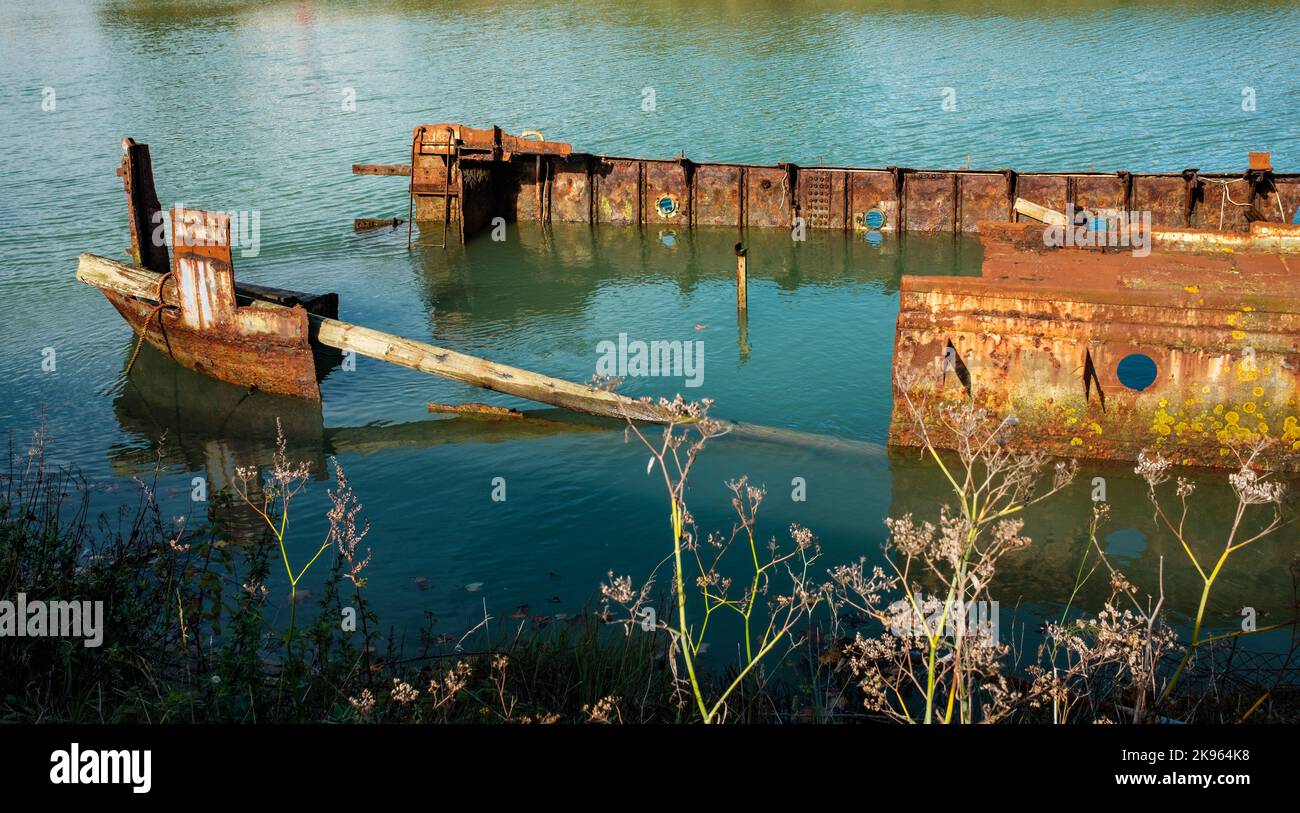 Remains of a sunken barge on the River Ouse at Newhaven, Sussex, UK Stock Photo