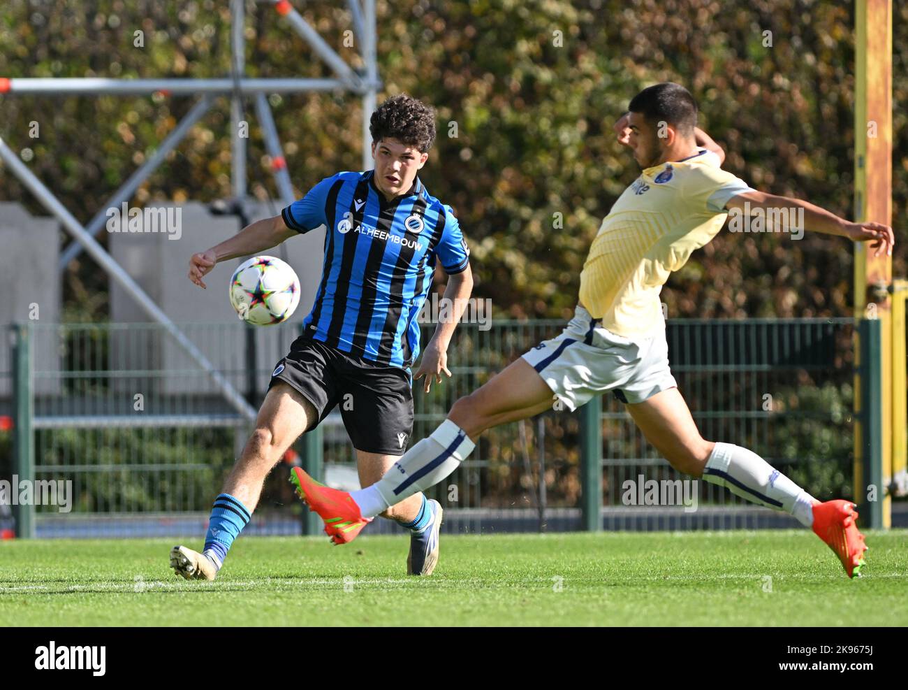 Kyriani Sabbe (2) of Club NXT pictured with Gabriel Bras (4) of FC Porto  during a soccer game between the youth teams of Club Brugge KV and FC Porto  during the fifth