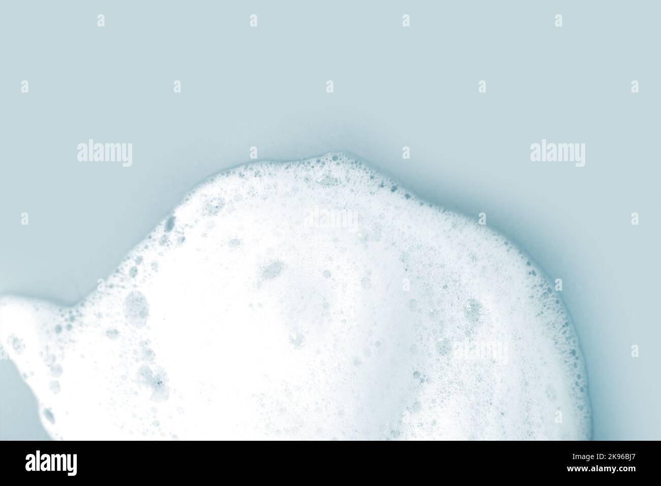 Skin care cleanser mousse foam texture. Soap, shower gel shampoo foam