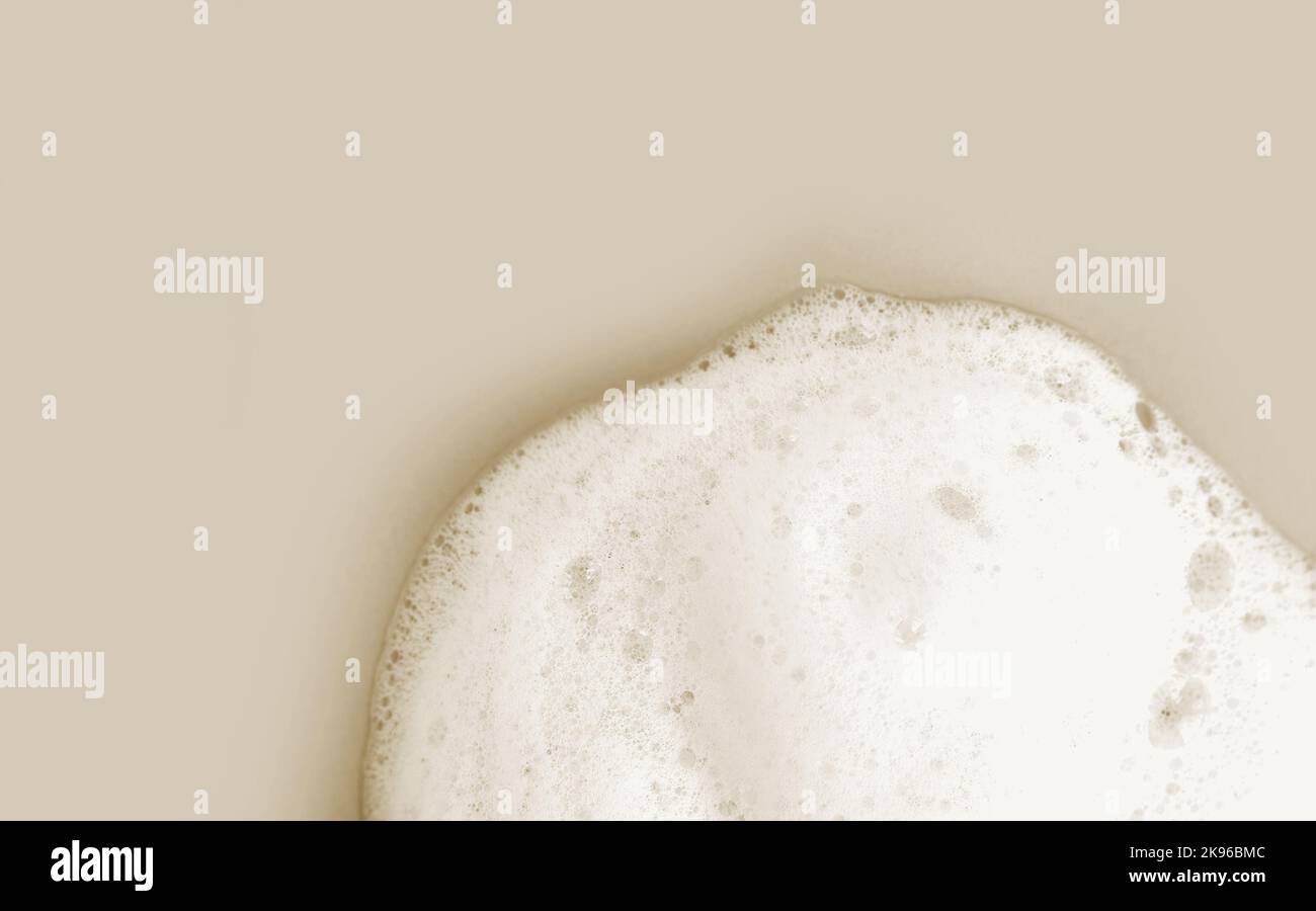 Skin care cleanser mousse foam texture. Soap, shower gel shampoo foam