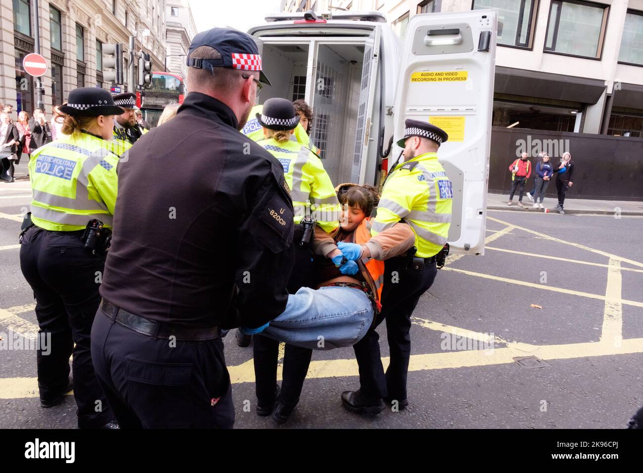 London, UK. 26 OCT 2022. Just Stop Oil activists block Piccadilly rd. by green park tube station. Angry drivers dragged some of the protesters and the pollice arrested them. Stock Photo