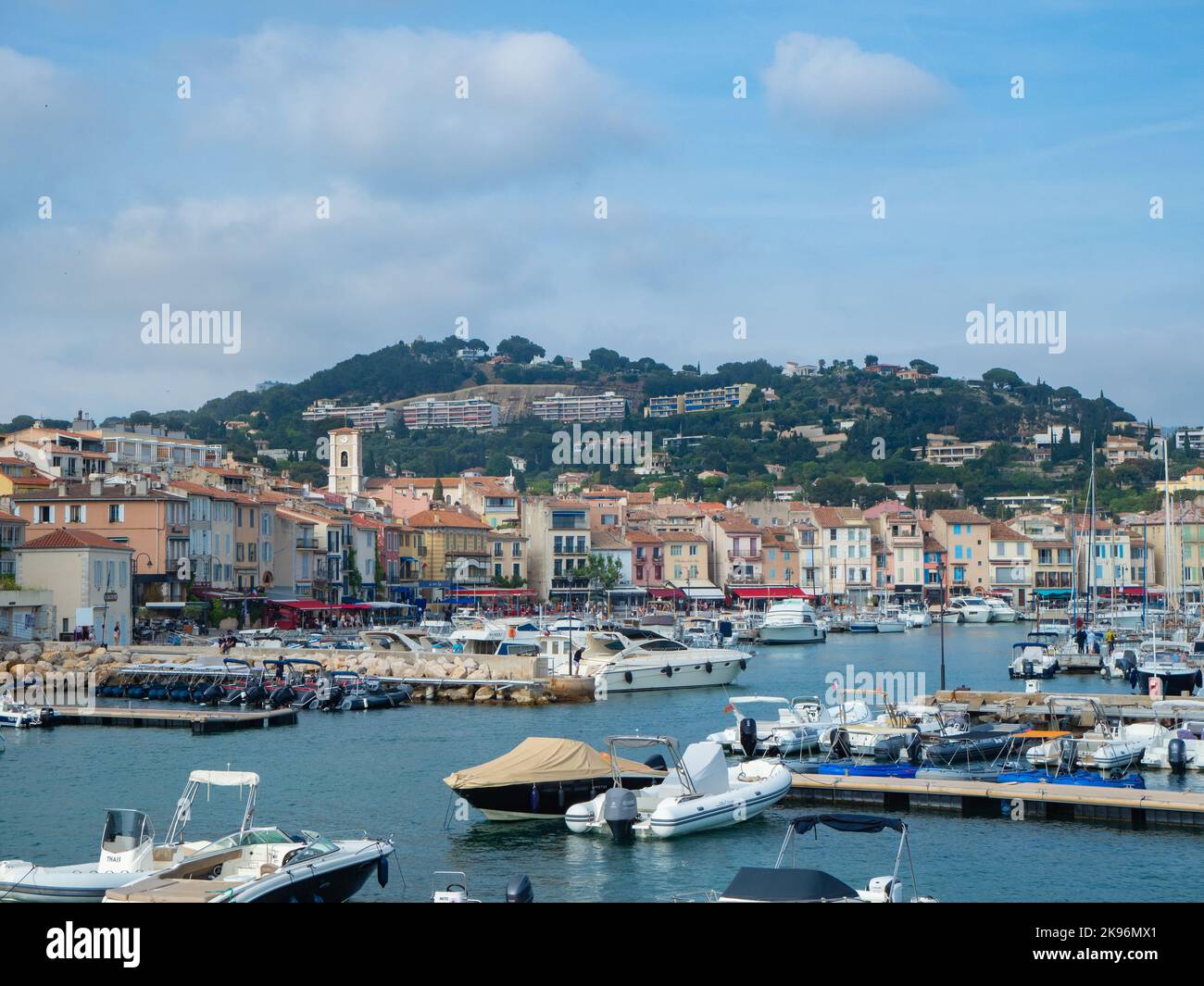 Cassis, France - May 18th 2022: View over the old harbour towards the ...