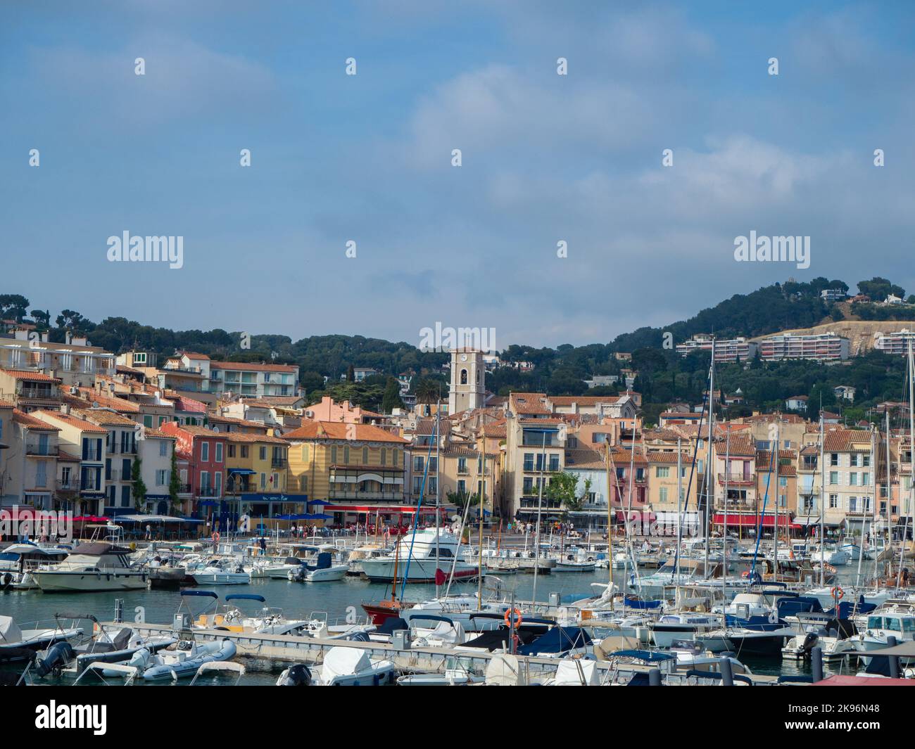 Cassis, France - May 18th 2022: View over the old harbour towards the ...