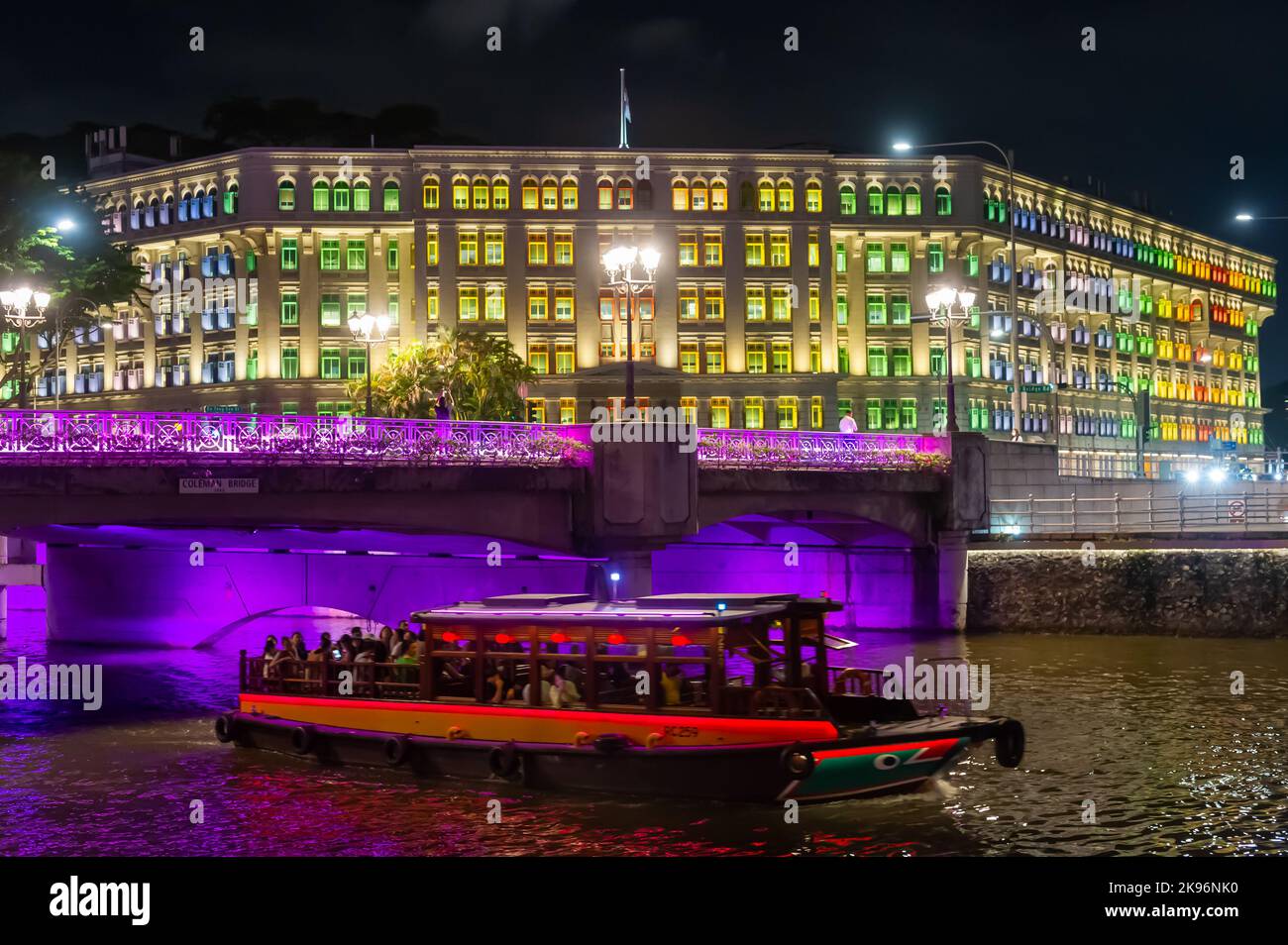 Old Hill Street police Station at night, with the illuminated Coleman