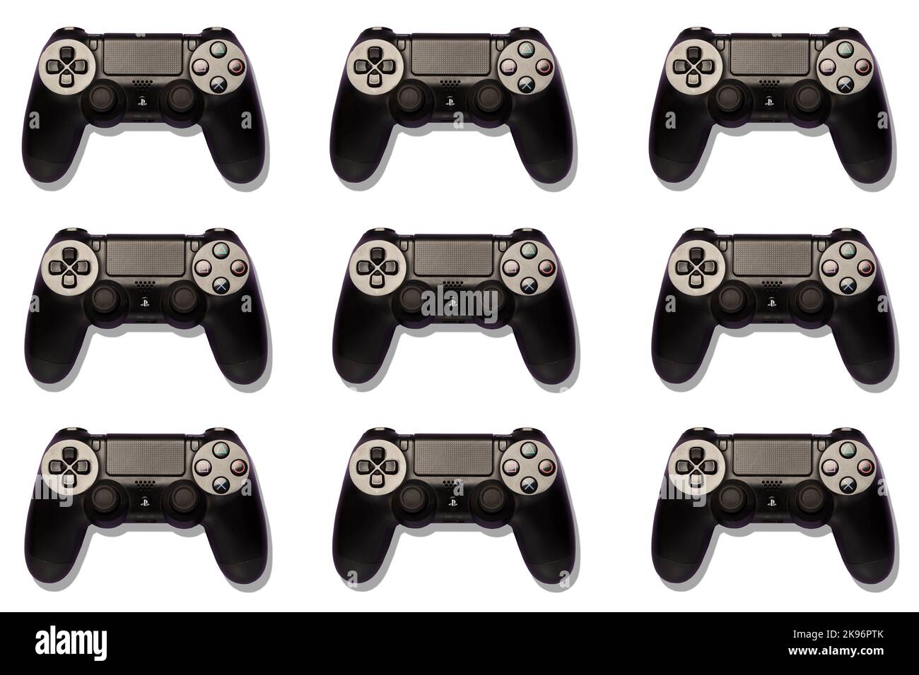 top view of playstation joypads on a colourful background, repetition, pattern, pop, professional studio shot, gaming, gamers, players Stock Photo