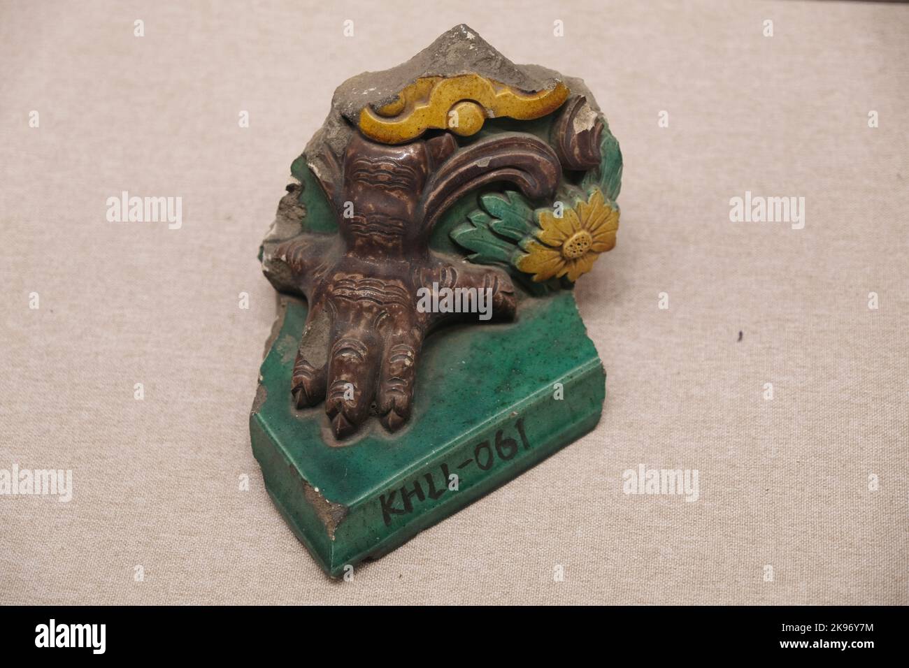A broken piece of a statue in the Yuanmingyuan Ruins Park Zhengjue temple, Beijing, China Stock Photo