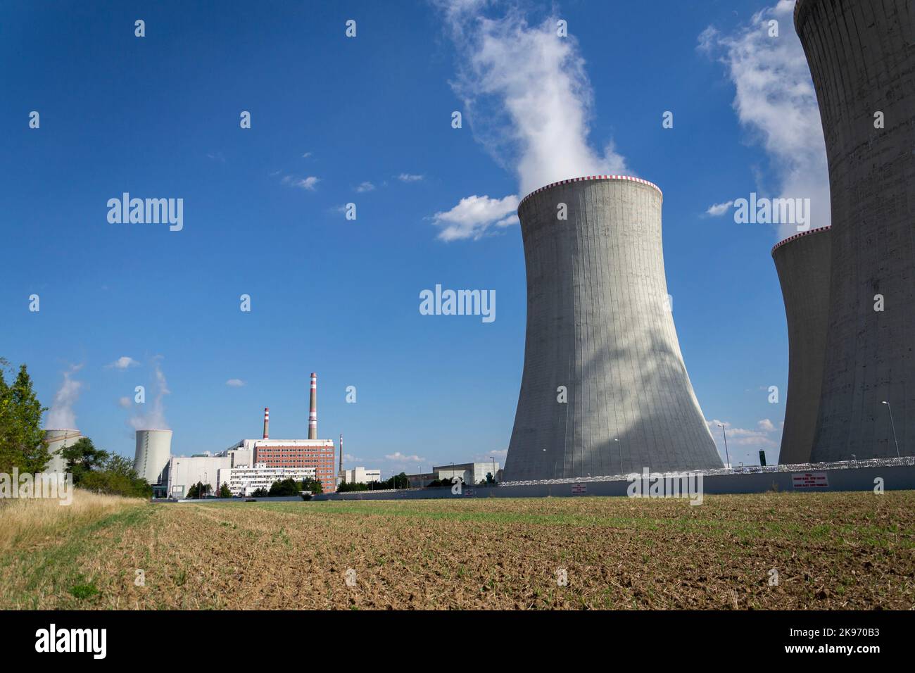 Cooling towers at nuclear power plant, energy self-sufficiency, greenhouse emission reduction Stock Photo