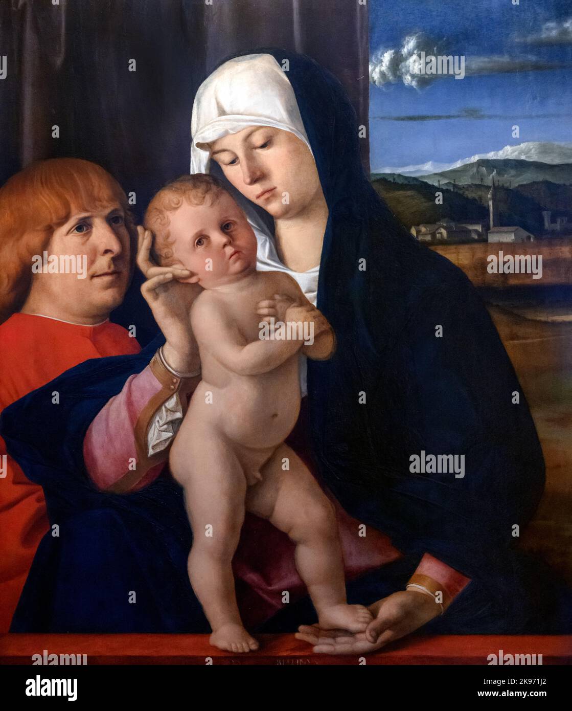 Madonna and Child with a Donor by Giovanni Bellini (c.1435-1516), oil on panel Stock Photo