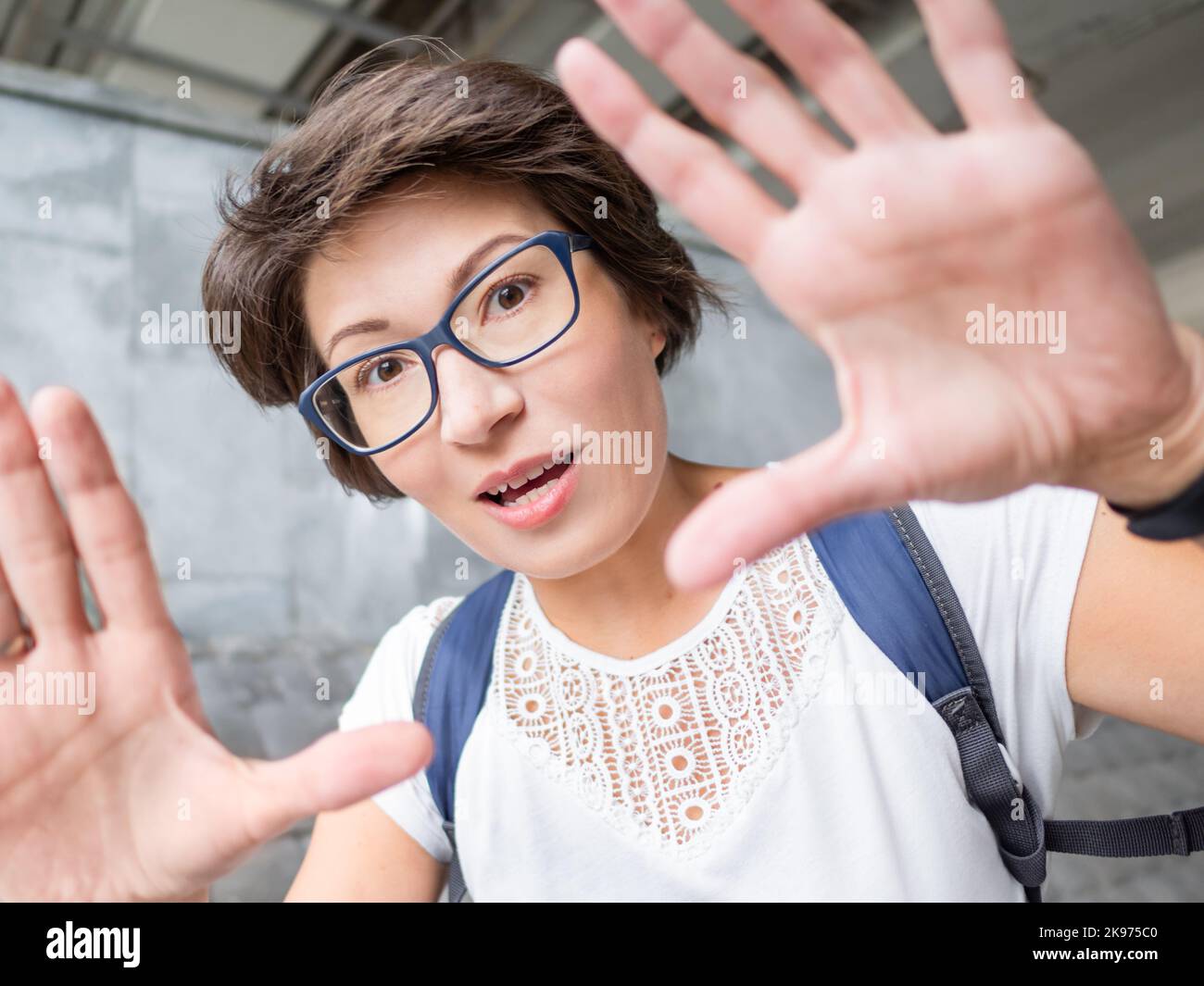 Excited woman with short hair in eyeglasses. Summer vibes. Sincere emotions. Stock Photo