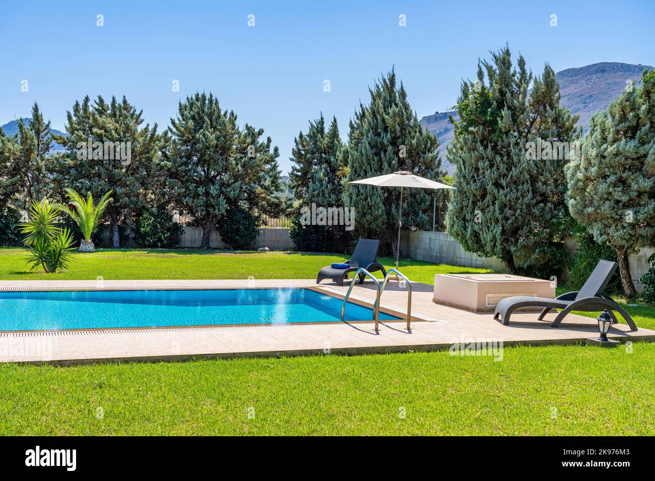 A swimming pool and deck Stock Photo