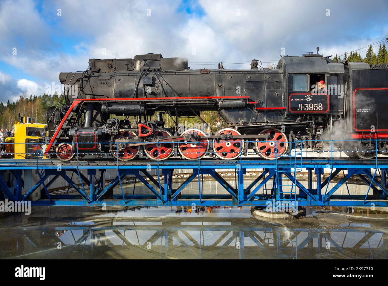 RUSKEALA, RUSSIA - OCTOBER 09, 2022: Retro steam locomotive on a turning circle. Ruskeala, Karelia Stock Photo