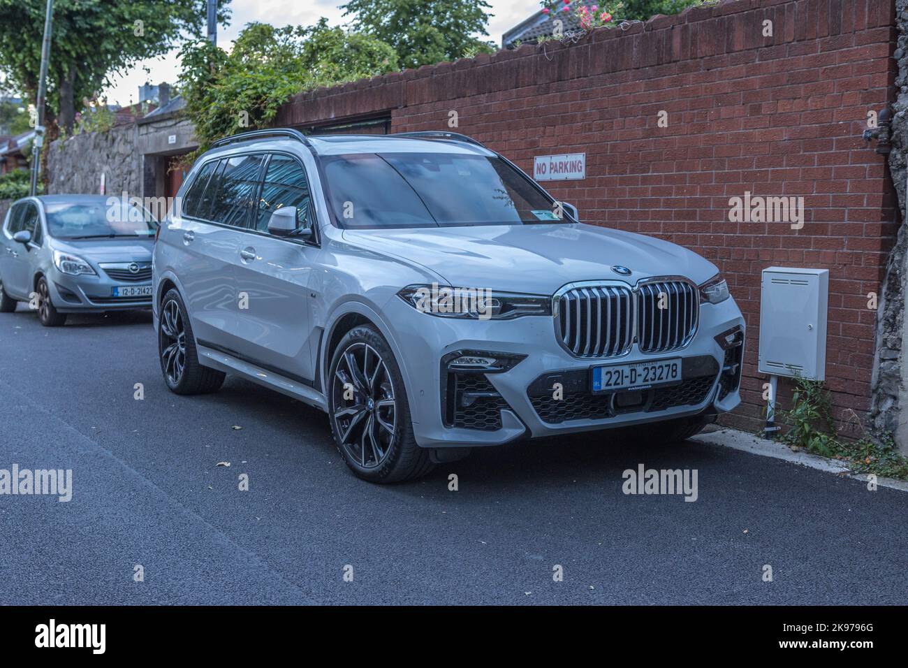 Dublin, Ireland - July 7 2022 "Dublin streets during the sunset, BMW X7 ...