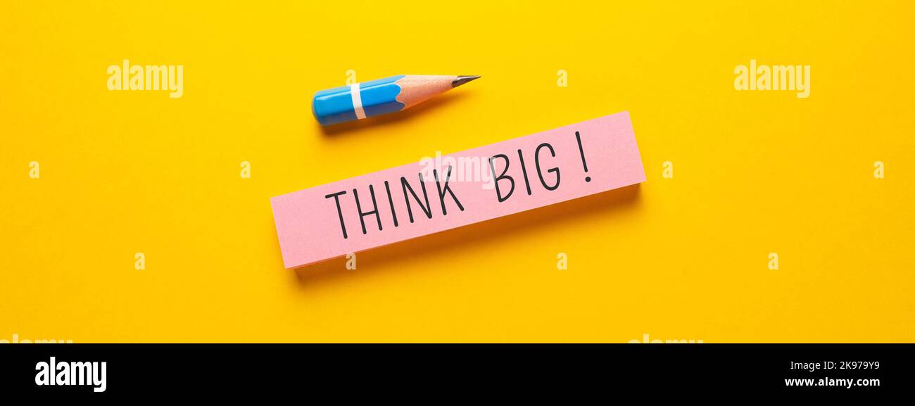Close up conceptual shot of a business idea showing Think Big Stock Photo