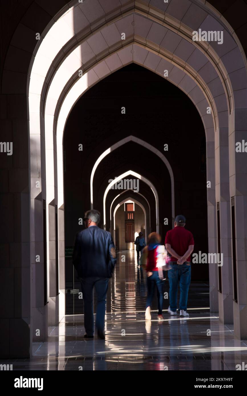 Muscat, Oman - March 05,2019 : Tourists tour in the Sultan Qaboos Grand Mosque. Stock Photo