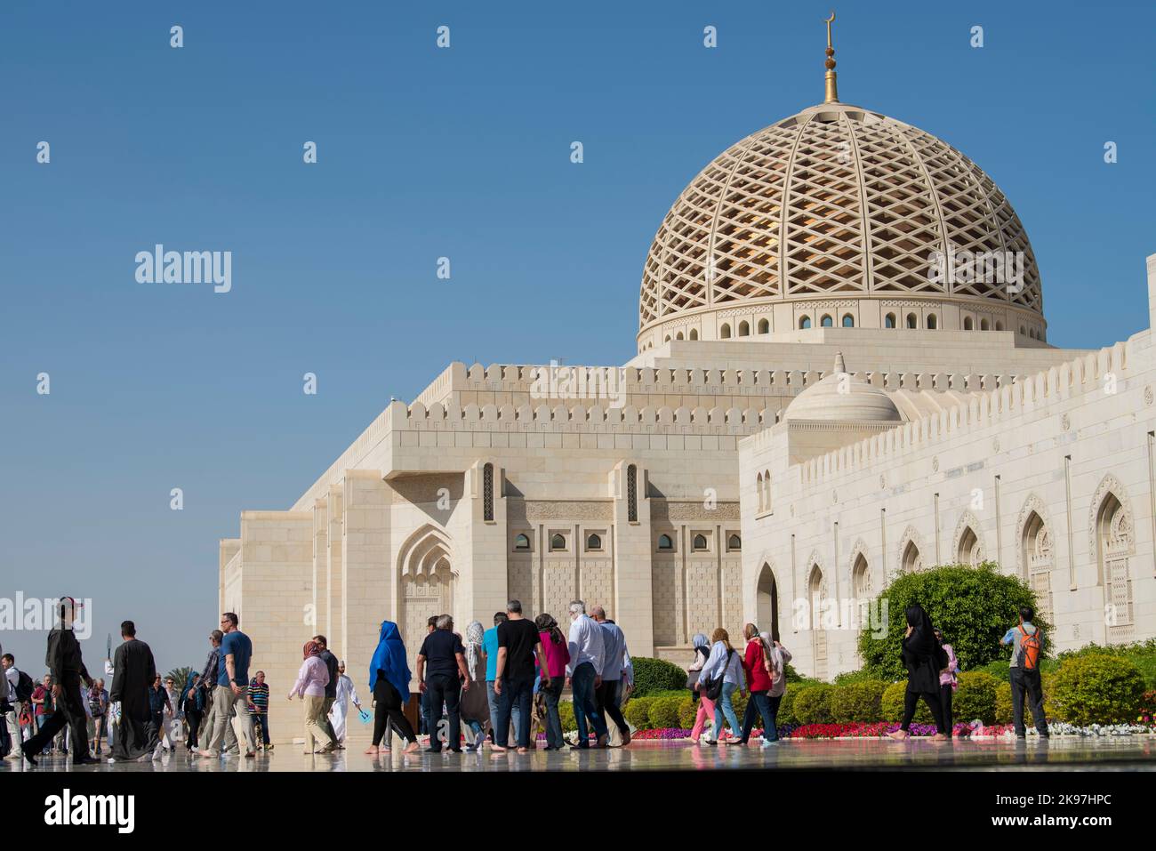 Muscat, Oman - March 05,2019 : Tourists tour in the Sultan Qaboos Grand Mosque. Stock Photo