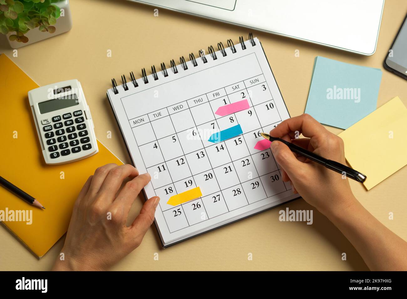 Calculator and calendar with reporting days Stock Photo Alamy