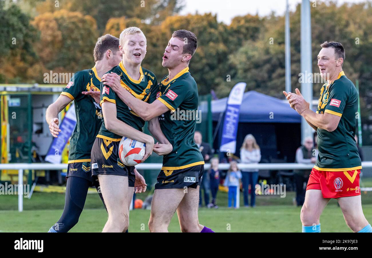 2022 Physical Disability Rugby League World Cup at Victoria Park, Warrington. Australia took on New Zealand. Group hugs as Australia score a try Stock Photo