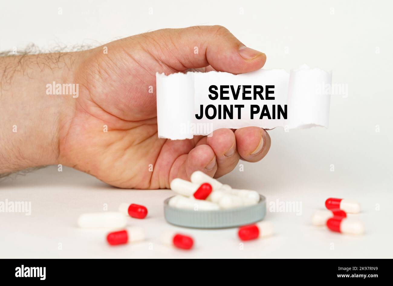 Medical concept. On a white background, medical capsules, in the hands