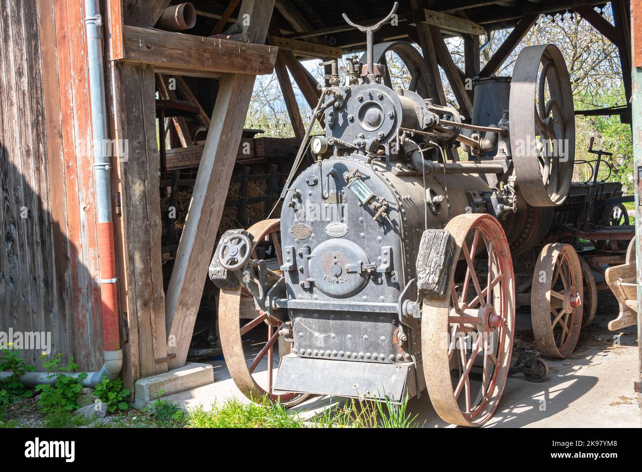 Steam farming agricultural tractor engine Ecomuseum Alsace in city of Mulhouse, Alsace, France Stock Photo