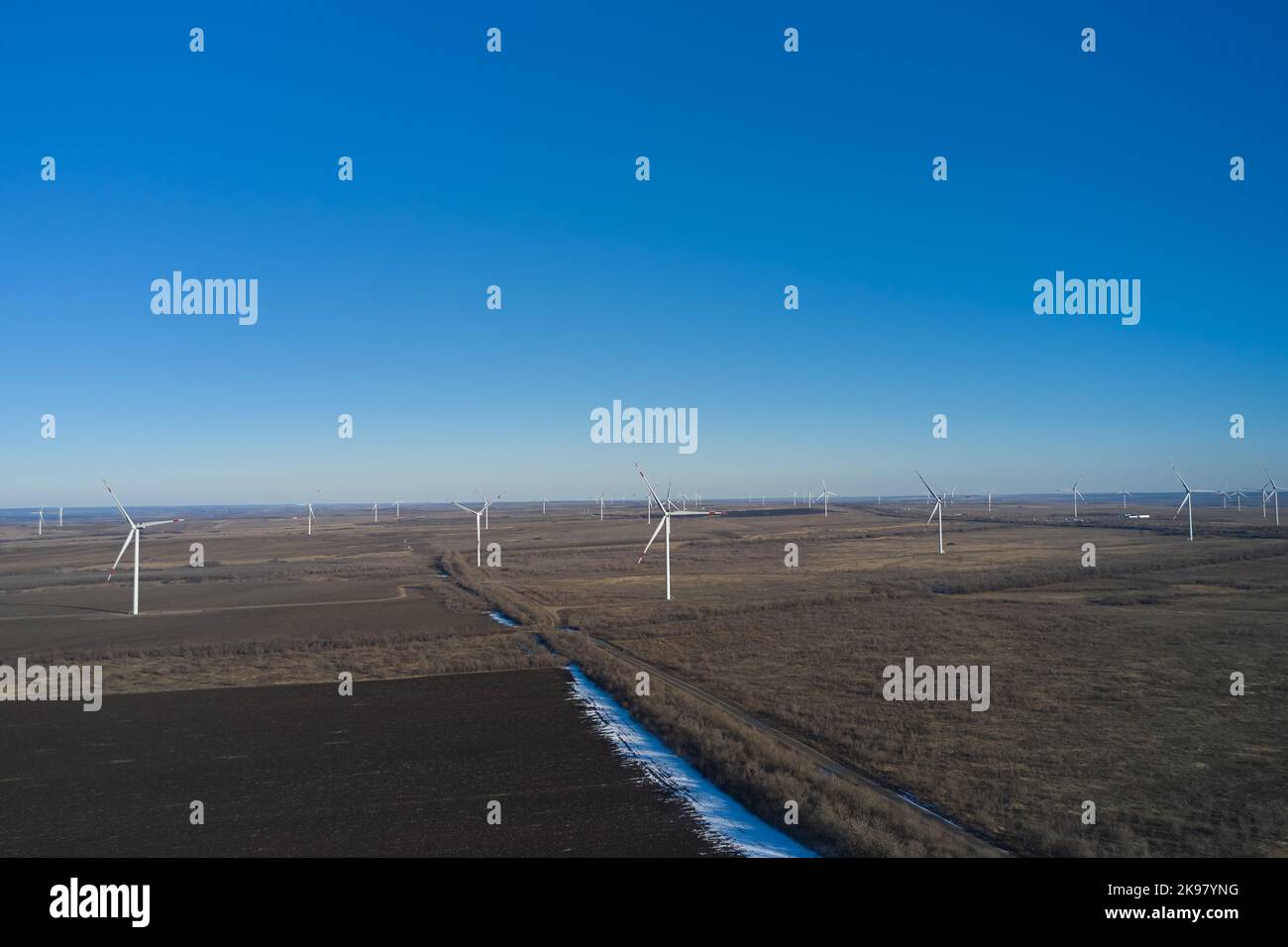 Wind turbines farm in winter, aerial view. Stock Photo