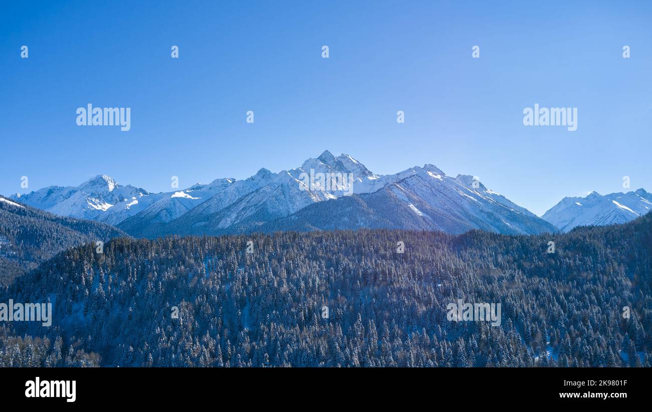 Winter landscape in mountains at sunny day. Stock Photo