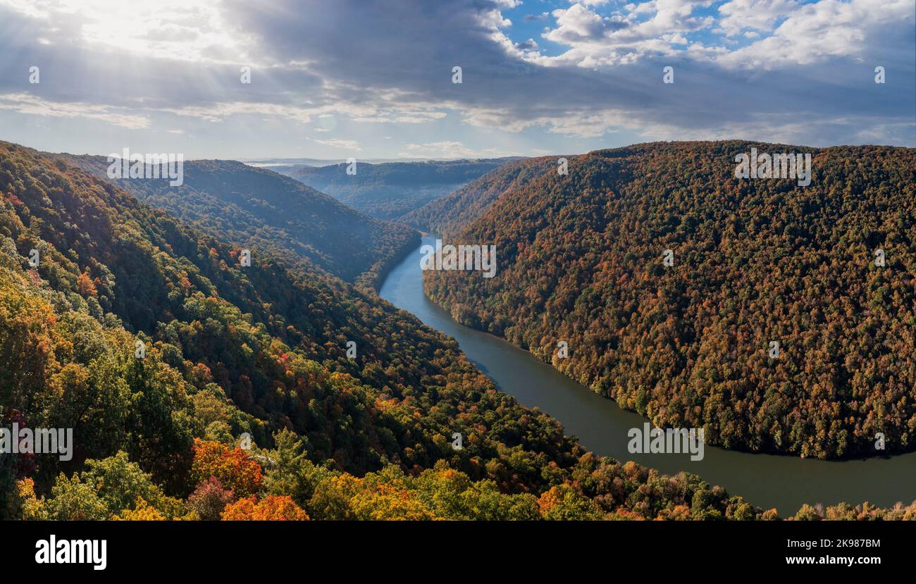 View up the Cheat River in narrow wooded in the autumn. Coopers Rock Forest is near