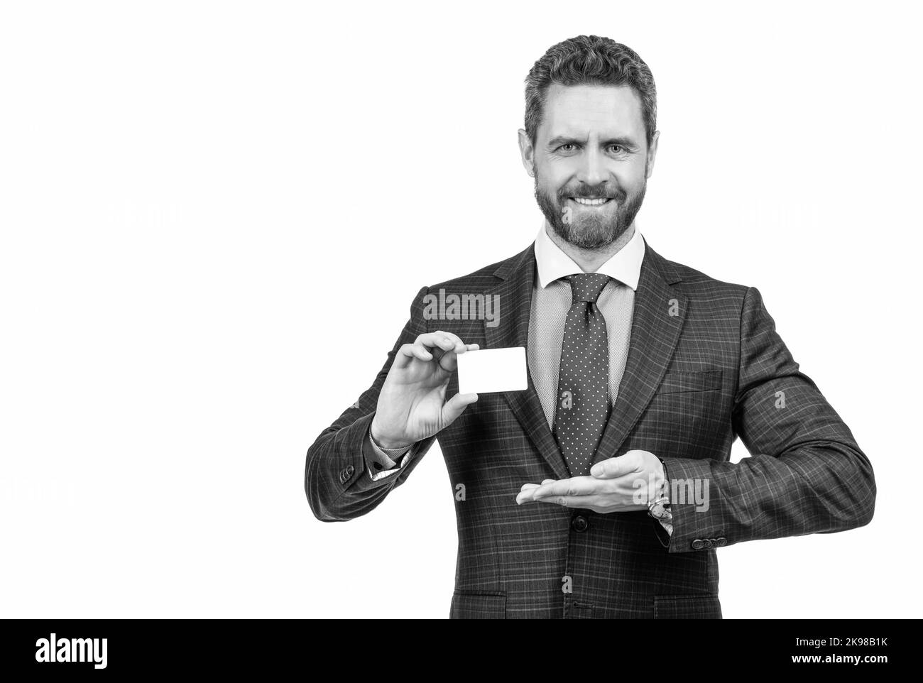 look over there. happy handsome boss man presenting product, copy space