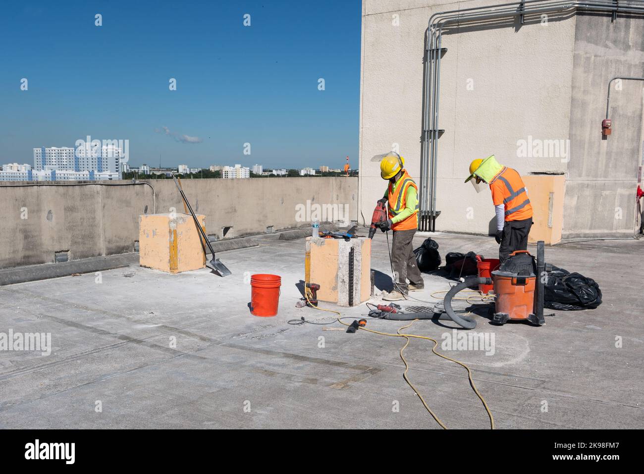 Construction Workers in Parking Lot Stock Photo Alamy