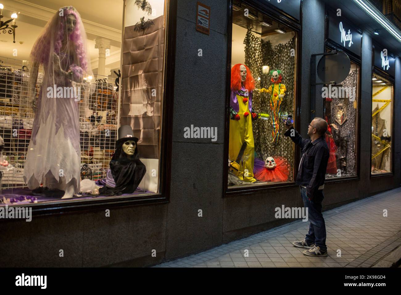 Madrid, Spain. 26th Oct, 2022. A man takes a picture of one of the