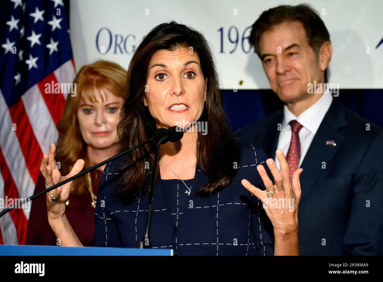 Harrisburg, Untied States. 26th Oct, 2022. Republican candidate for Senator Mehmet Oz listens as Former Governor of South Carolina Nikki Hailey speaks in Harrisburg, PA, USA on October 26, 2022. TV-personality Dr. Oz runs in a tight race against Democrat former Lt. Governor of Pennsylvania John Fetterman. Credit: OOgImages/Alamy Live News Stock Photo