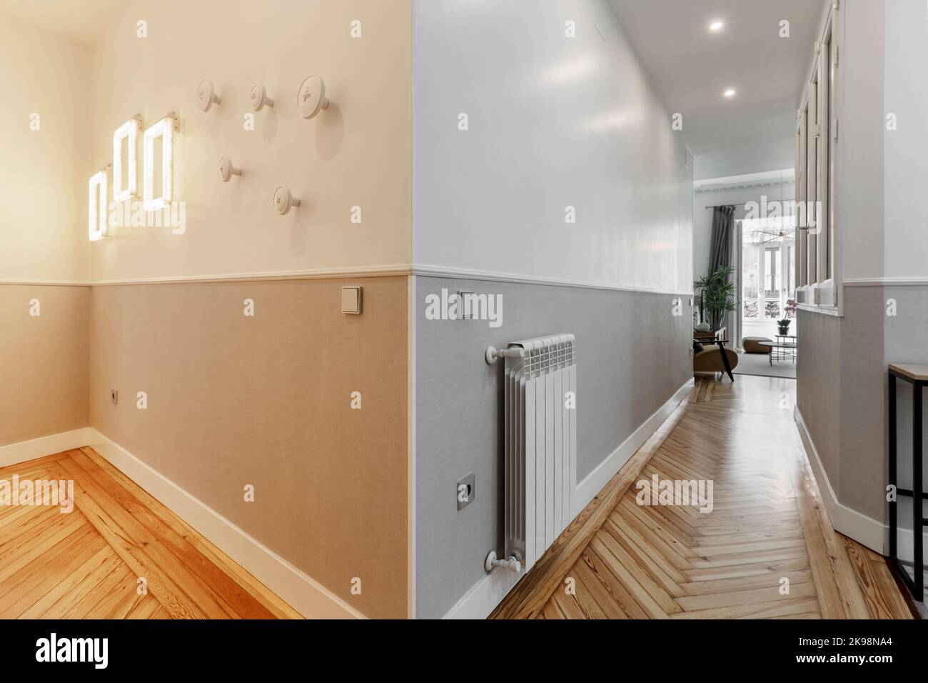 Corridor of an urban residential house with varnished pine wood