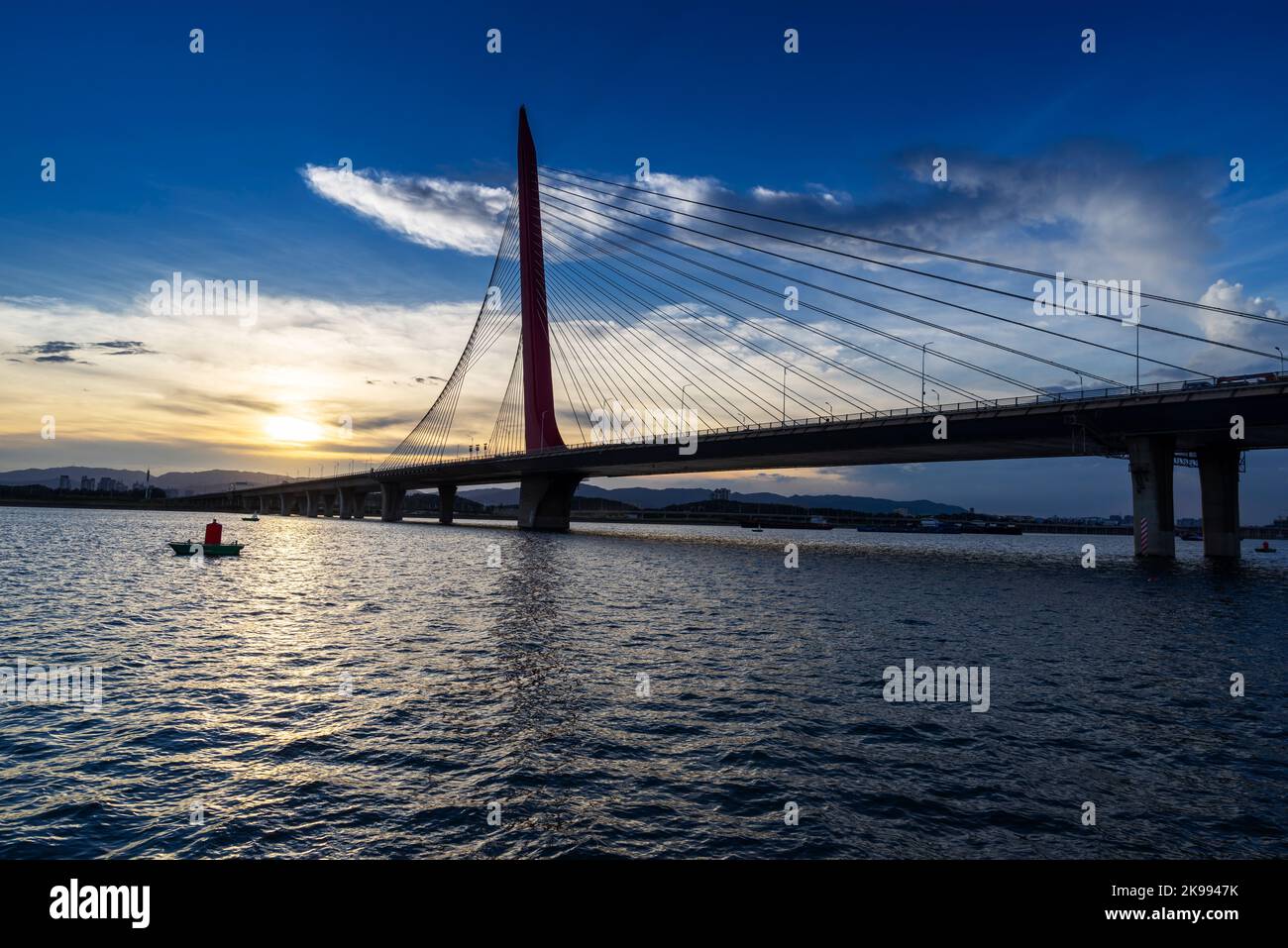 Cable stayed bridge at sunset Stock Photo - Alamy