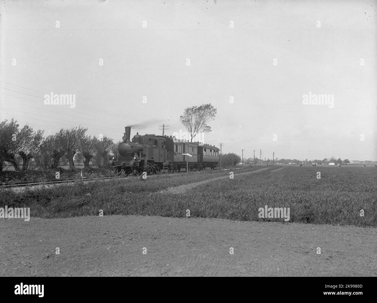 Bend locomotive 6. Steam locomotives with passenger cars. Transferred1934 to bend 52. Look made in 1918 by Nohab with the shaft sequence 1C. Manufacturing number 1131. was scrapped in 1955. Stock Photo