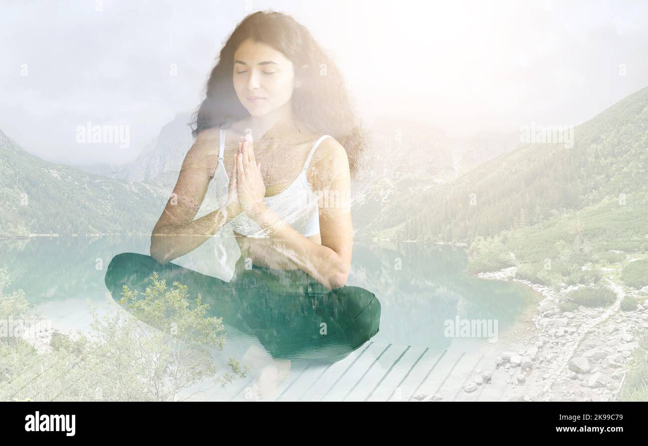 Double exposure of meditating young woman and landscape with mountain lake Stock Photo