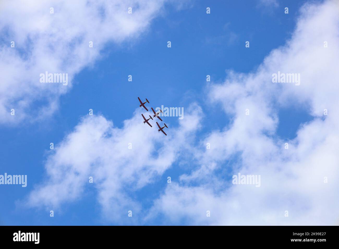 Modern airplanes flying in blue sky Stock Photo - Alamy