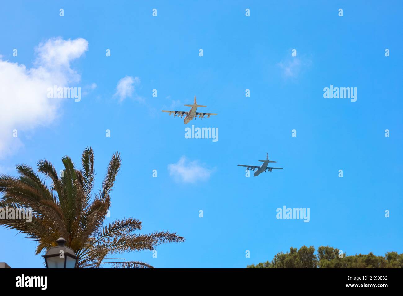 Modern airplanes flying in blue sky Stock Photo - Alamy
