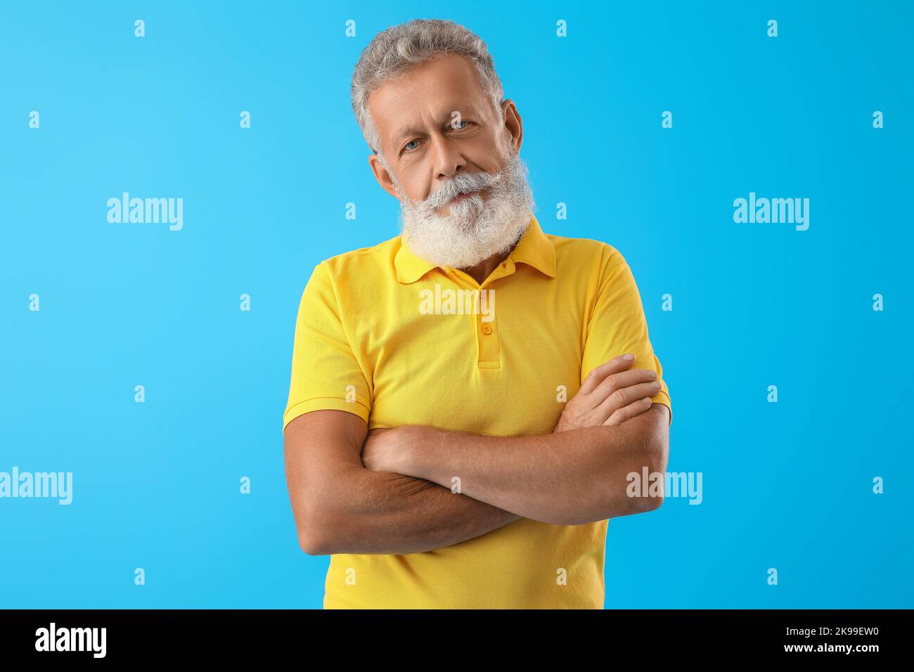 Bearded man in yellow shirt hi-res stock photography and images - Alamy