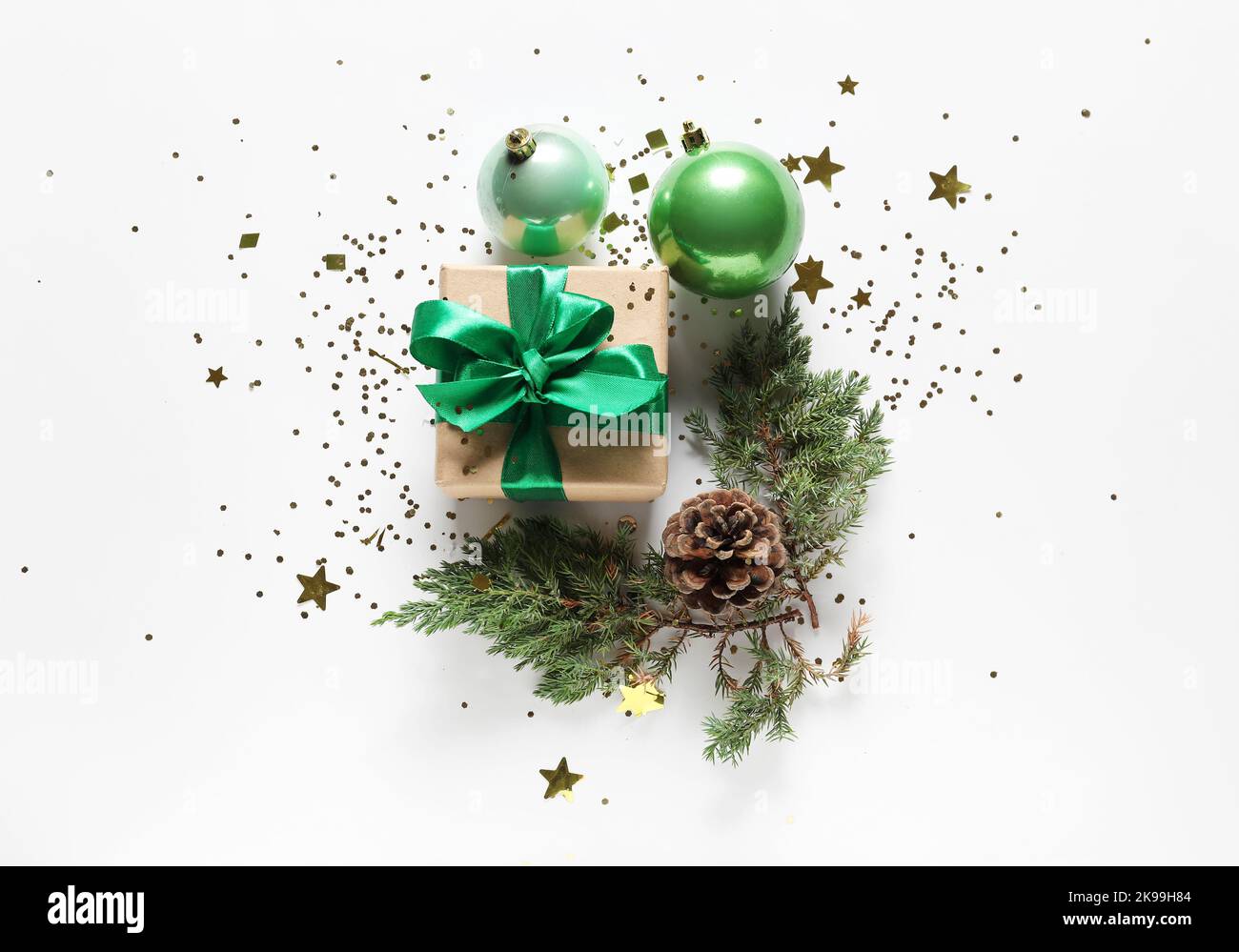 Present Ball Composition with Christmas gift, balls and fir branches on white ...