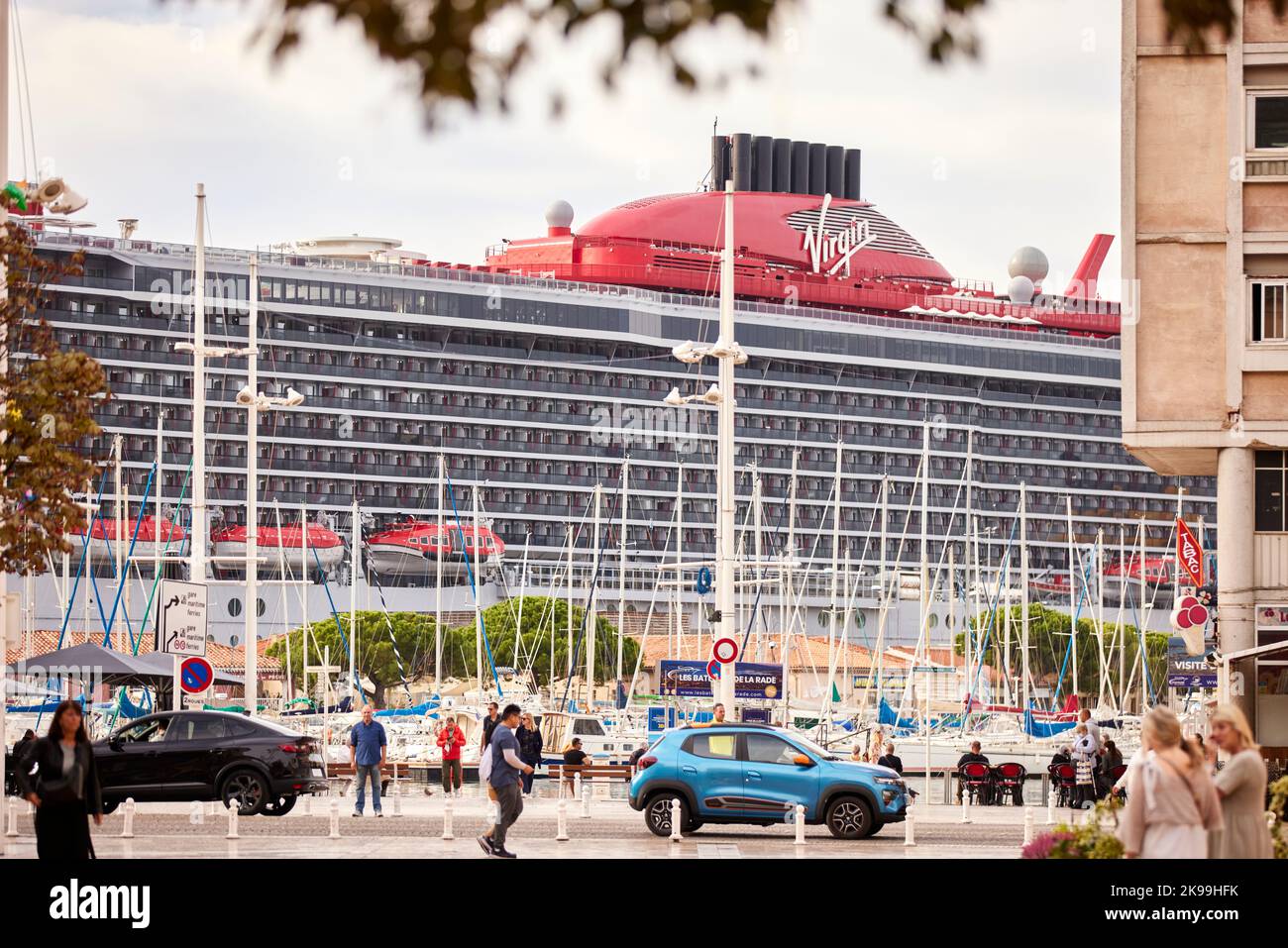 Toulon port city on southern France’s Mediterranean coast, busy marina harbour and Valiant Lady cruise ship operated by Virgin Voyages Stock Photo